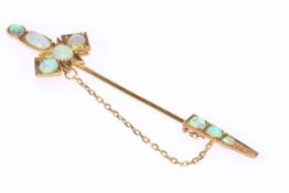 Opal set brooch in the form of a sword,