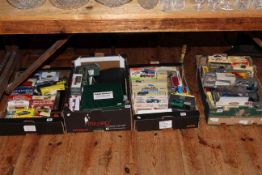 Four boxes of Corgi and other model vehicles including Eddie Stobart