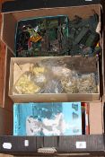 Box of military vehicles, plastic soldiers, Darlington, FA Cup and other football programmes,