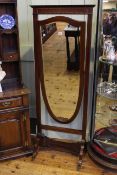 Edwardian mahogany and satinwood banded arched top cheval mirror