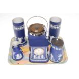 Six pieces of Wedgwood blue Jasperware including vase, clock,