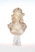 Alabaster bust of young female on an onyx base