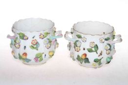 Pair of Continental porcelain floral encrusted and insect painted two-handled cache pots