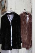 Two ladies fur coats,