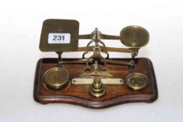 Edwardian brass and oak postal scales