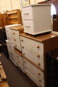Modern white three drawer chest and pair matching two drawer pedestals together with a white and