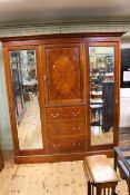 Edwardian mahogany and chequer inlaid combination wardrobe having central cupboard above three