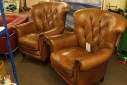 Pair tan leather button backed armchairs