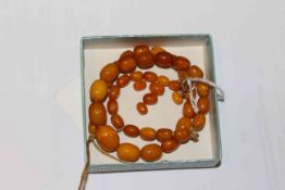 Amber coloured bead necklace