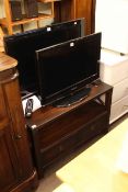 Two Samsung televisions and two drawer entertainment unit