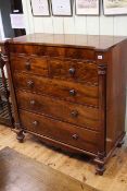 Victorian mahogany chest of six drawers having tapering pillars and turned legs,