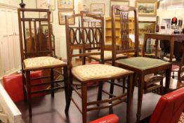 Four Edwardian inlaid mahogany bedroom chairs