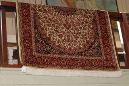 Keshan rug with a beige ground 1.90 by 1.