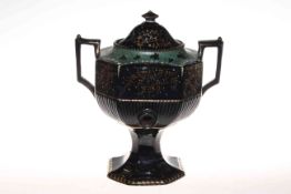 Black lustre china urn with floral and gilt decoration