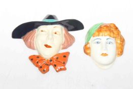 Two 1930's/40's pottery wall masks