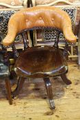 Tan buttoned leather captains style swivel desk chair