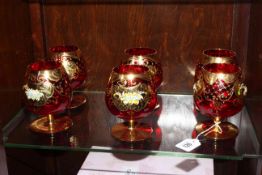 Set of six ruby and gilt decorated Murano glass goblets