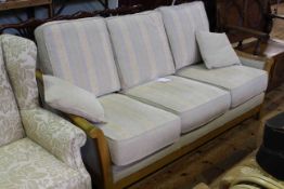 Ex Barkers three seater settee in light striped fabric