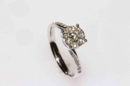 Diamond cluster ring set in 18 carat white gold,