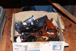 Box of cameras and accessories