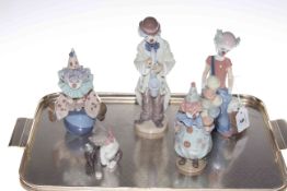 Four Lladro figures and Lladro cat and mouse