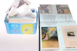 Album and box of vintage postcards