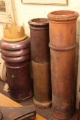 Collection of five salt glazed and terracotta chimney pots