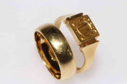 Two 18 carat gold rings,