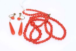 Coral graduated bead necklace and pair of earrings