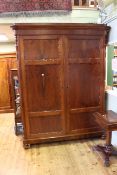 19th Century Continental rosewood two door armoire on turned legs,