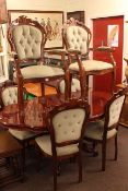 Italian style oval shaped top dining table and six chairs including pair carvers