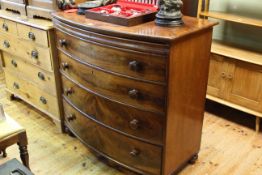 Victorian mahogany bow front chest of four long drawers on turned legs