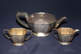 Silver three piece tea set of octagonal form, Sheffield circa 1968,