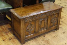 Period style carved oak triple panel front coffer,