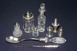 Five silver and silver topped condiments, crystal handled silver server,