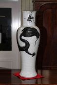 Large Oriental crackle glaze vase with raised mythical dragon decoration,