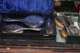 Silver backed brushes and mirror in two cases
