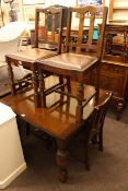 Oak draw leaf dining table and four chairs together with a Lloyd Loom bedroom chair (6)