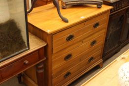 Satin walnut chest of three long drawers