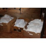 Three boxes of assorted lace and linen