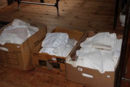 Three boxes of assorted lace and linen