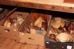 Three boxes of wooden ornaments, bowls, vessels,