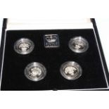 Boxed set of four £1 silver proof Piedfort coins 1984-87,