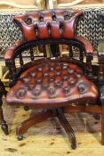 Ox blood buttoned leather captains style swivel desk chair