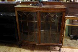 1920's mahogany two door china cabinet on ball and claw legs
