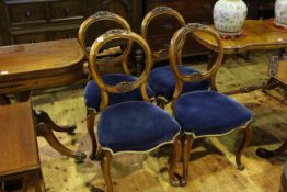 Set of four Victorian walnut balloon back parlour chairs on cabriole legs