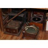 Three table top gramophones and two portable gramophones