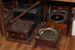 Three table top gramophones and two portable gramophones