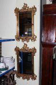 Pair gilt framed bevelled wall mirrors