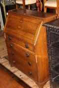 Early 20th Century oak, chequer and shell inlaid four drawer bureau,